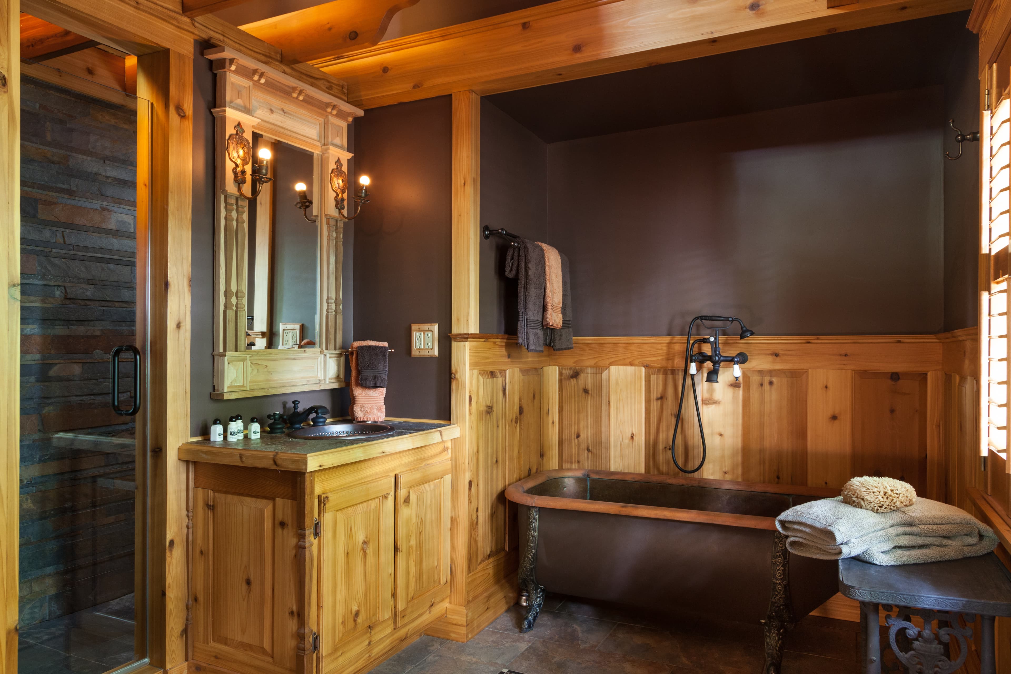Private bathroom with copper tub and walk in shower