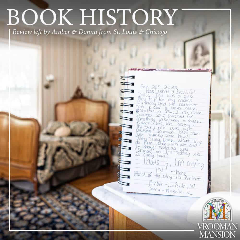 hand written journal on a marbletop dresser with an antique bed in the background